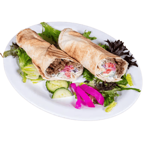 Fresh warm pita sandwich stuffed with crispy falafel and garlic sauce